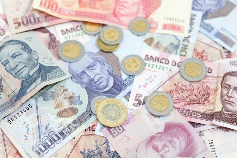 Mexican Peso trades blended as PMIs test health of international economy