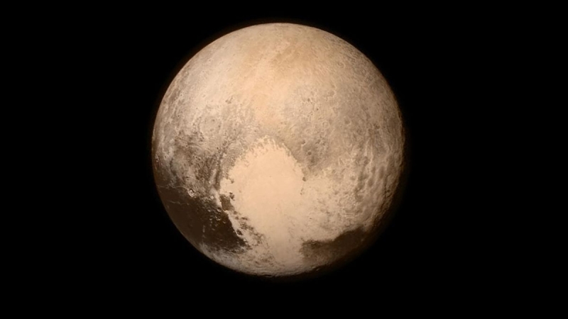 Pluto’s big white ‘heart’ has a remarkably violent origin, brand-new research study recommends